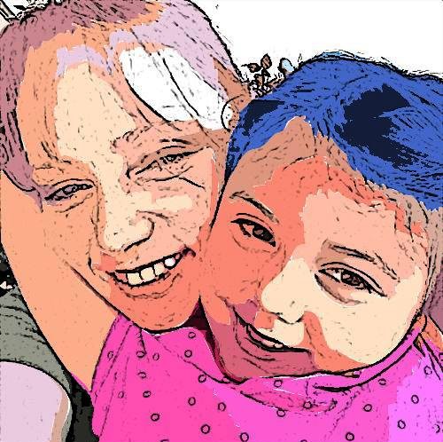 Picture30 - The Canada Times Two people smiling in a close-up selfie, a child in a pink shirt in the foreground beside an adult.
