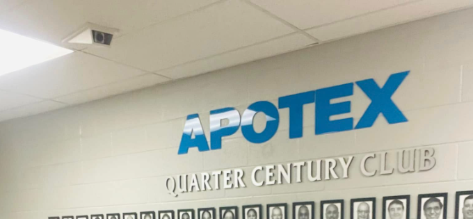 2 - The Canada Times APOTEX logo on a wall above the words 'Quarter Century Club' with a row of black-and-white portrait photos beneath.